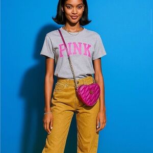 Pink cross body heart shaped bag